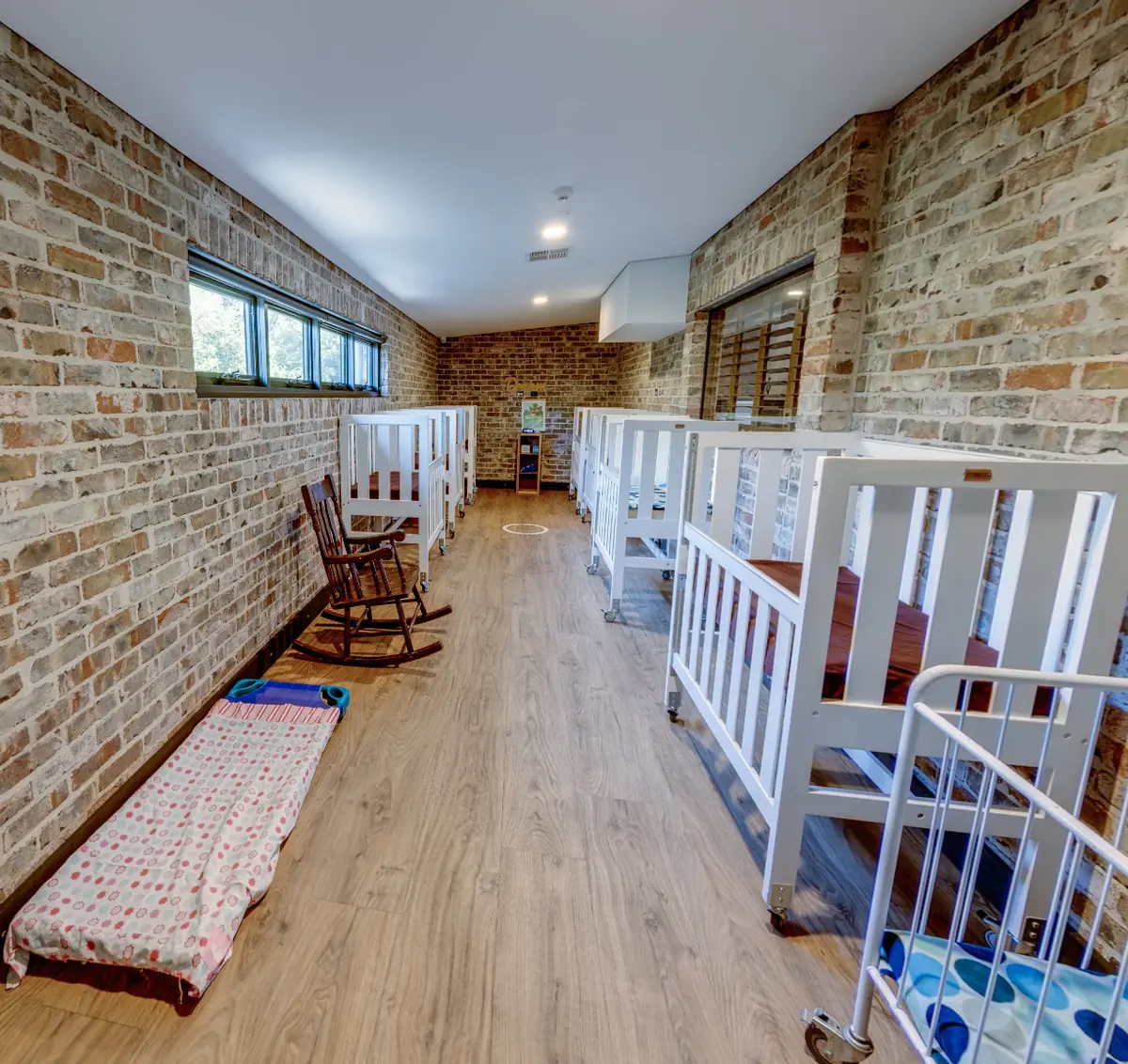 Quiet cot room for sleeping babies at Little Blossoms Academy childcare Horsley Park
